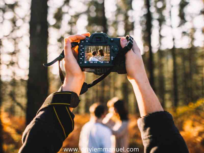 A-camera-taking-a-couple-photoshoot-as-21 Enchanting Valentine's Day Couples Photoshoot Ideas 1. Romantic Sunset Shoot at the Beach